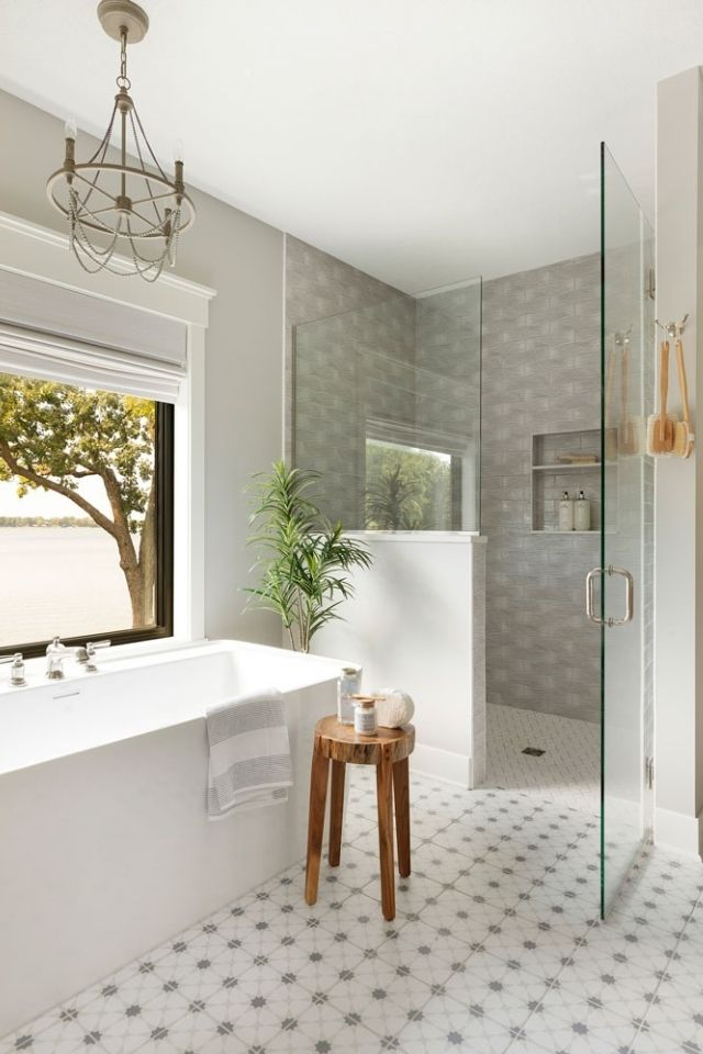 Walk in shower with a half wall designed by Kate O'Hara